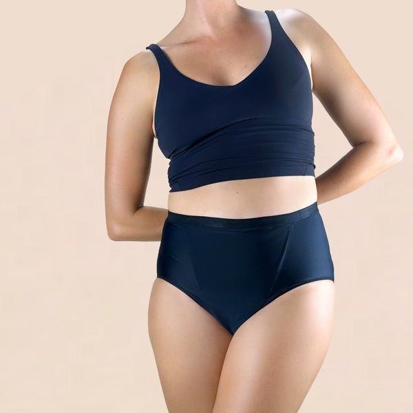 Woman wearing Hem Support Wear High-Waisted Brief pelvic floor support underwear in black
