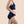 Side view of model wearing Hem Support Wear's prolapse support underwear high waisted brief in black